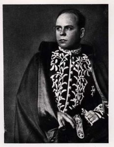 Marcello Piacentini wearing the uniform of the Royal Academy of Italy captured in black and white.