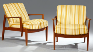 Pair of Finn Juhl Danish Modern Carved Teak Arm Chairs.
