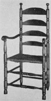 18th-Century Chair: The decorative turning of uprights, finials, front stretchers, and shaping of the arms are typical of the finer chairs made in New England during this period.