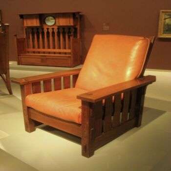 一个djustable-Back Chair No. 2342 (1900): photo of a comfy-looking chair with large arms and a orange leather cushion.