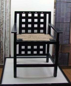Black chair by Charles Rennie Mackintosh.