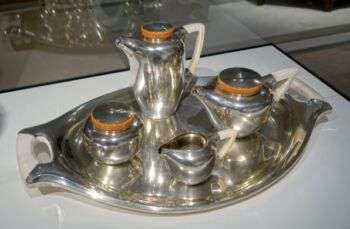 Coffee and tea service by Henry van de Velde, c. 1903-1904, silver, ivory, bakelite.