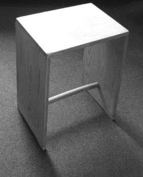 Ulmer Hocker (1954) by Max Bill: a small wooden stool.