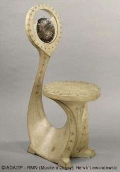 眼镜蛇椅(1902)由卡洛·布加迪:一个抽象的座位与轻木